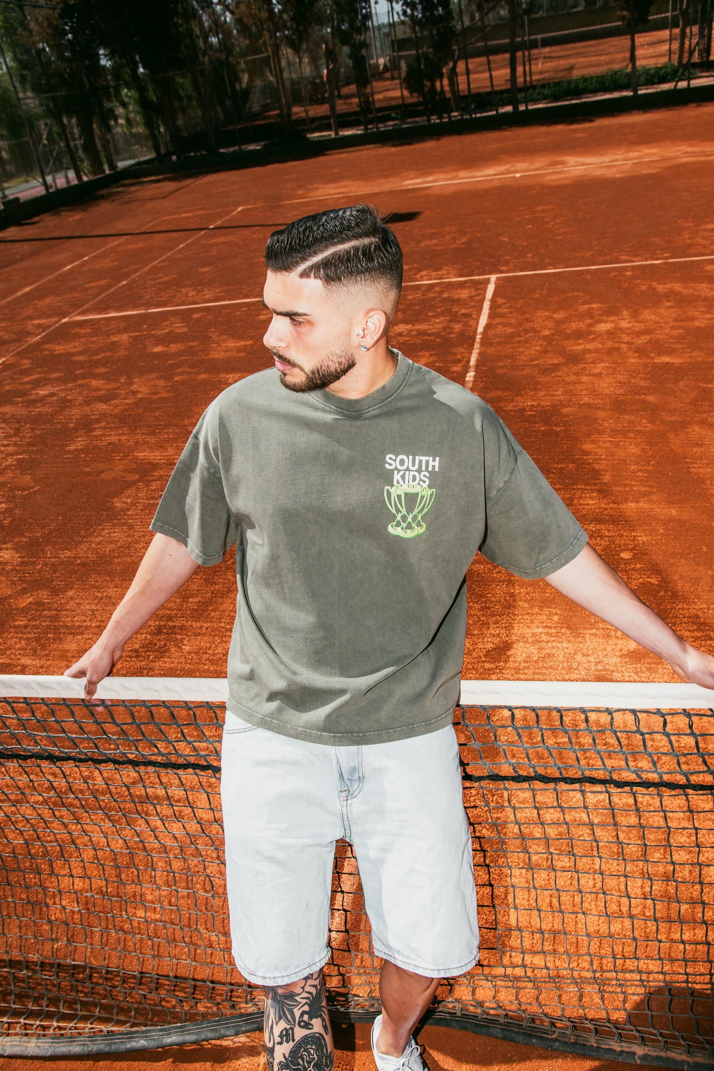 Champions Tee