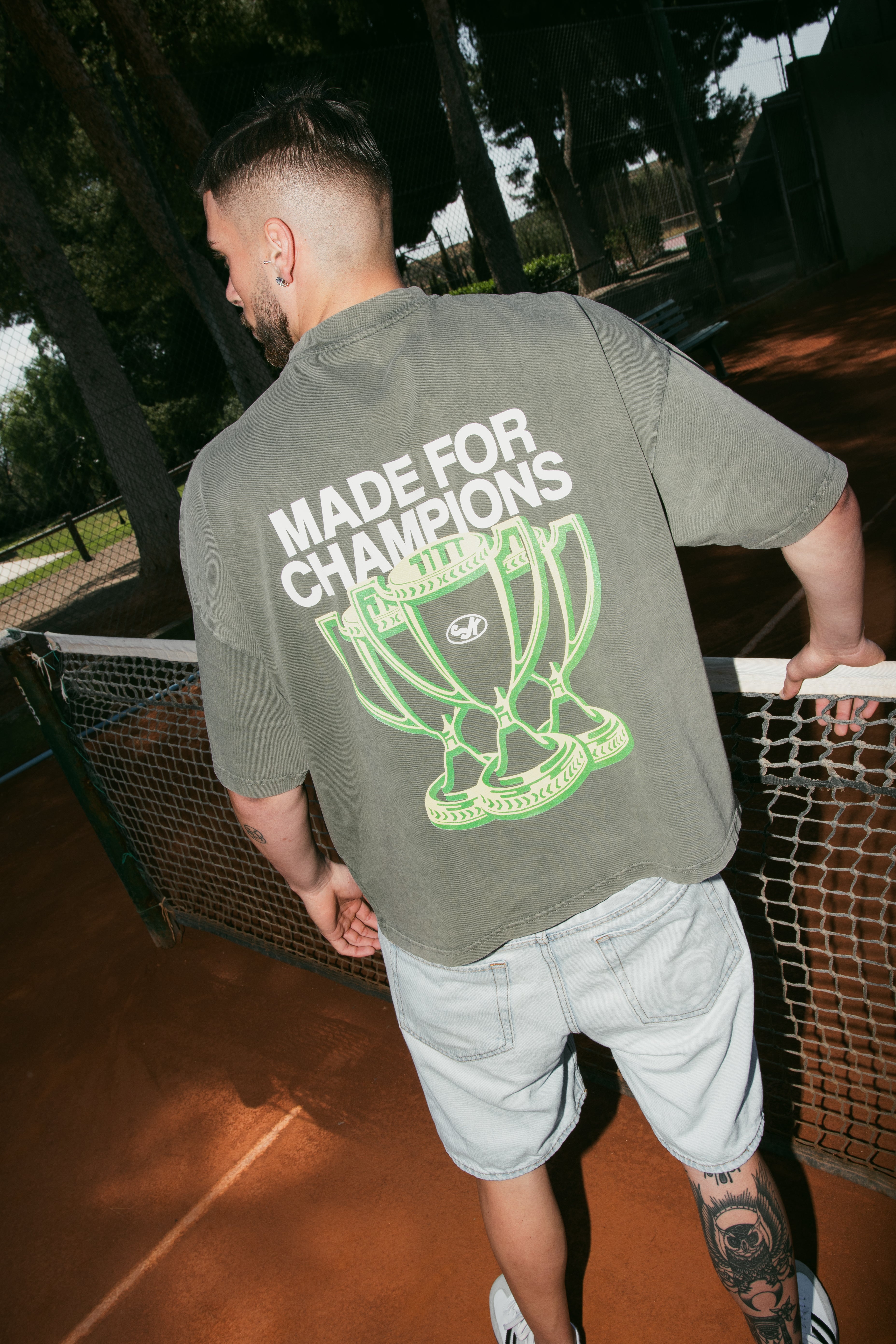 Champions Tee